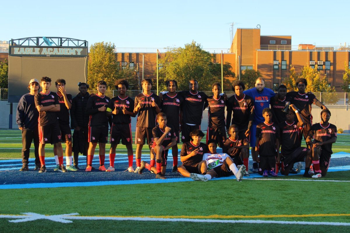 Group photo of the Prospect Heights Cardinals after their huge victory against Uncommon High 14-0